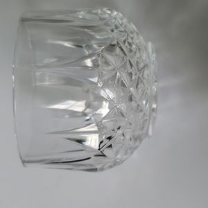 Votive or punch cup. Cut glass pressed 9 pt star bottom.
